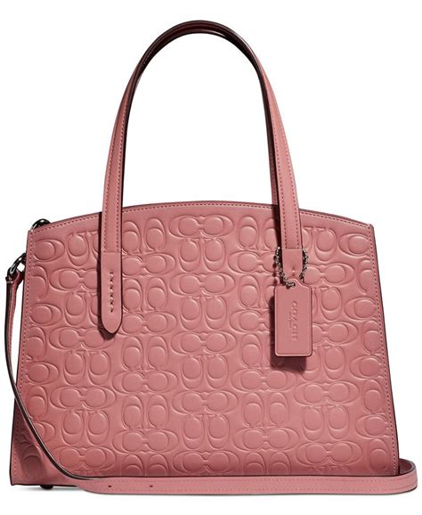 coach charlie carryall 28 in signature leather